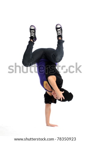 Asian woman balancing on one arm upside down break dancing