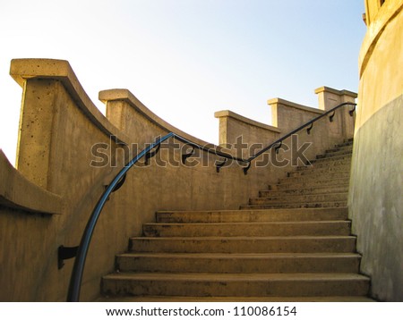 Curved outdoor steps in the morning Sunlight.