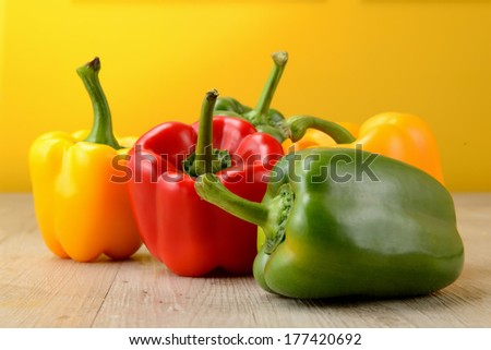 green, yellow and red bell pepper