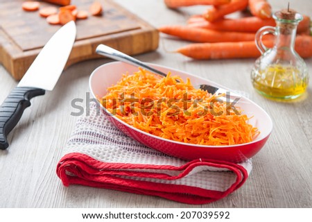 garnish with chopped carrots and oil