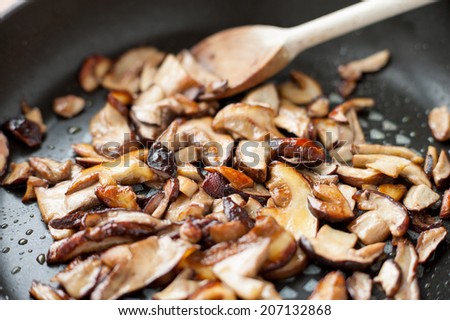 mushrooms cooked in a pan