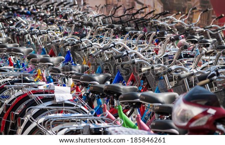 HUNCHUN, CHINA - MARCH 31, 2012: Sales of bicycles in the shop on the one of city squares Hunchun city. Hunchun is a county-level city in the Yanbian Korean Autonomous Prefecture.