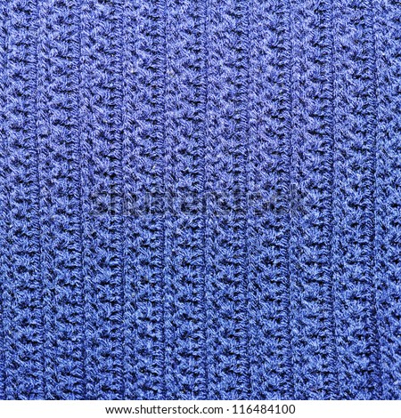 closeup of seamless blue knitted fabric texture