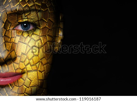 A shiny glass texture with mosaic tile pieces over woman face