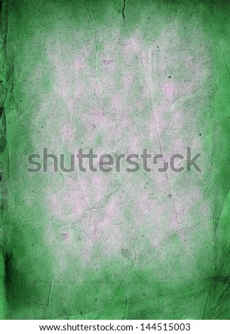 Old grunge green paper background or texture