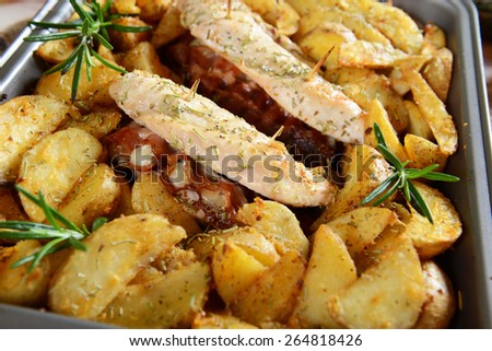 Chicken loins stuffed with bacon and gorgonzola cheese roasted with potatoes
