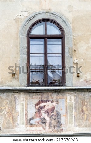 Florence (Firenze, Tuscany, Italy): detail of a palace in Santa Croce square: window and painting