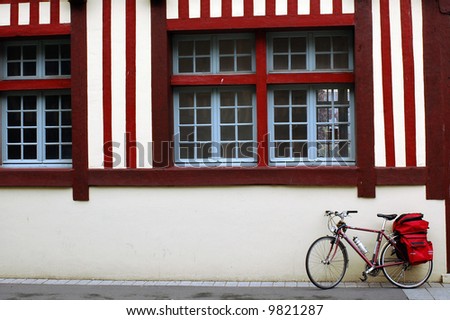 Pont l\'Évêque - Normandy (France) - Bicycle and red white house
