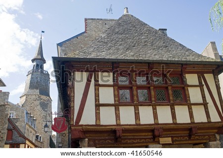 Dinan (Cotes-d\'Armor, Brittany, France) - Exterior of ancient half-timbered houses and tower