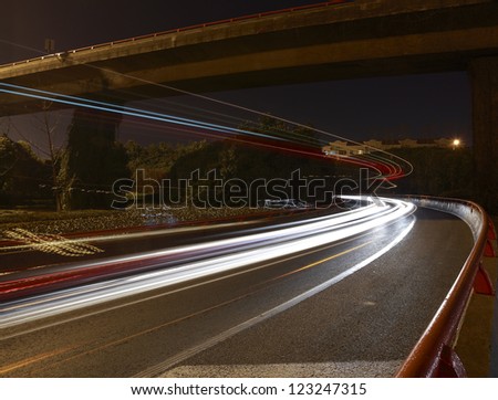 Long exposure photographs of urban night dusk highway traffic
