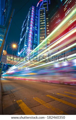 Hong Kong modern landmark buildings backgrounds of city road light trails