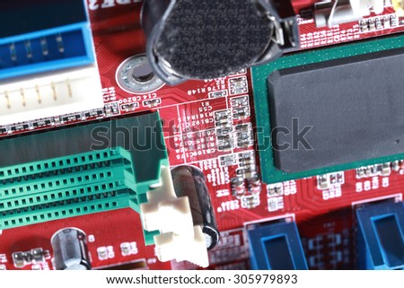 Close-up of electronic circuit red board with processor of computer motherboard