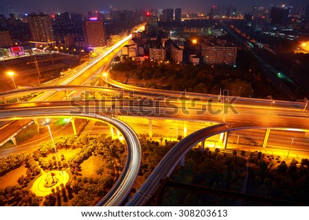 Aerial view of Wuhan at City viaduct overpass road night scene.Similar to the shape of the human eyes.