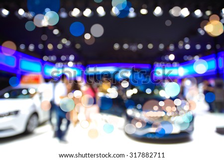 Blurred blurry soft focus background,People with Car at the mall indoor hall