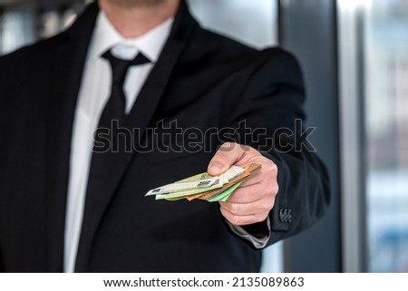 Similar – Image, Stock Photo Got a euro? Concept poverty, begging, begging and borrowing money.