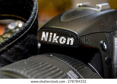 Ternopil, Ukraine May 13, 2015: Nikon brand logo on camera. Nikon is one of most popular brand of imaging products, situated in Tokyo, Japan