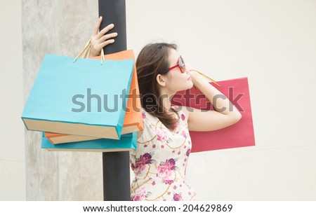 Girl With Shopping Bags,Beauty And Fashion Concept Background