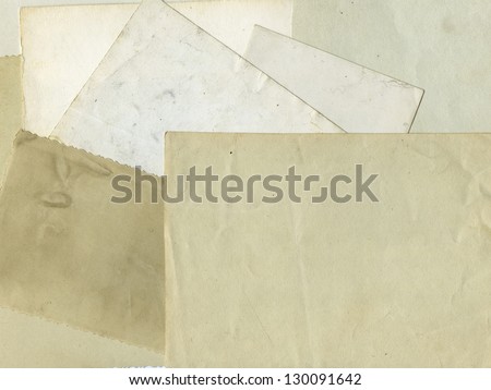 Stack of old photos with clipping path for the inside, old textured paper