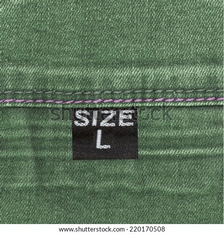 green jeans texture, seam, tag, size