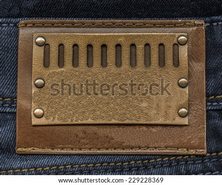 label on blue jeans background