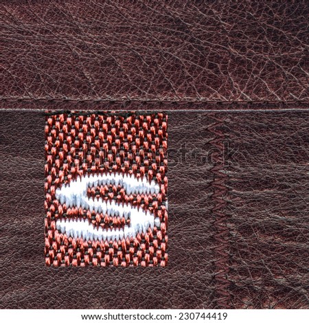 red-brown leather texture, tag,seams.