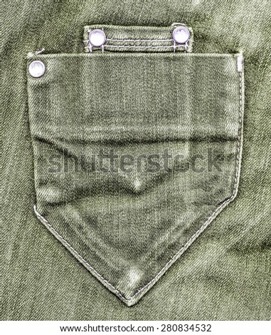 gray-green jeans pocket on jeans background