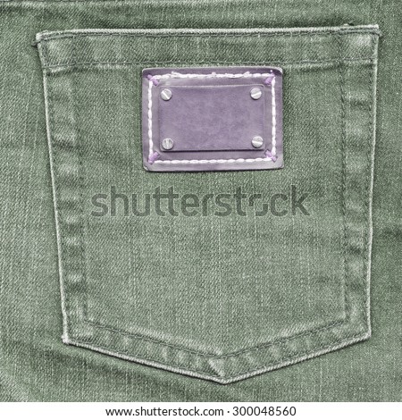 green jeans back pocket, violet label