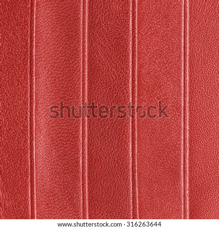 fragment of red leather products as background for design-works