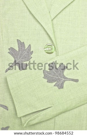 closeup of  jacket with leaf ornament