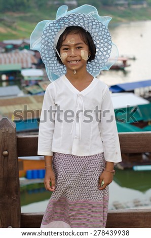 Sangklaburi,Thailand-May 3: Unidentified young asian girl with thanaka powder on face of this 