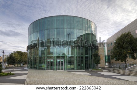 POZNAN, POLAND - JUNE 15, 2014: Glass building auditorium of the Academy of Music in Poznan. Building located in the city center at the intersection of St.. Marcin and Towarowa street.
