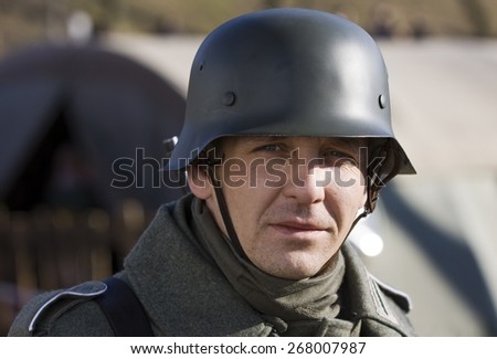 POZNAN, POLAND - MARCH 23, 2014: Re-enactment of the battle of the World War II. Anniversary of the liberation of the city of Poznan. In the picture one of the actors.