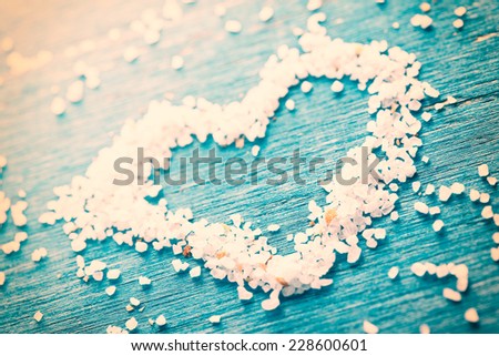 Close up photograph of a heart made with grains of salt