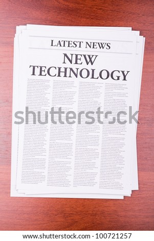 The newspaper LATEST NEWS with the headline NEW TECHNOLOGY