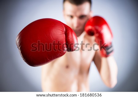 Boxing. Fighter's glove close-up. Bokeh.
