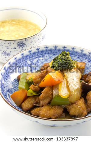 This is a picture of sweet and sour pork and soup I ate for dinner.