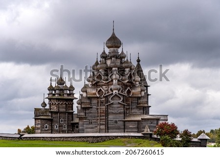 Picturesque autumn view of wooden churches on island of Kizhi, Karelia. Kizhi Pogost with The Church of the Intercession and The Church of the Transfiguration on Lake Onega in the Republic of Karelia. Сток-фото © 