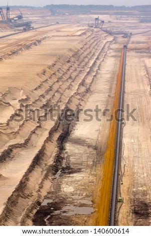 Conveyor-belt and excavators in a brown-coal mine