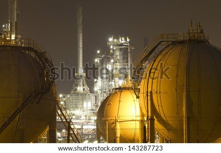 Gas storage tanks and a large oil-refinery plant
