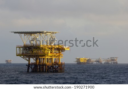 Oil rigs in an open sea