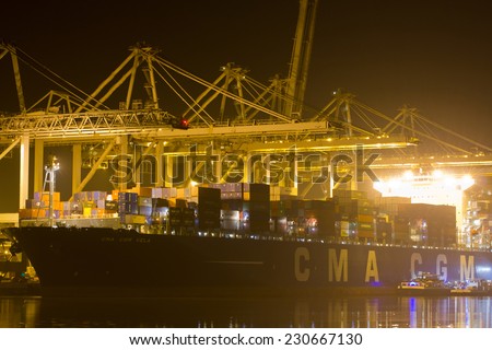 ROTTERDAM, THE NETHERLANDS - MARCH 15: Close-up of a containership, operated by a privately-owned company (CMA CGM) engaged in worldwide container transport in Rotterdam on March 15, 2012