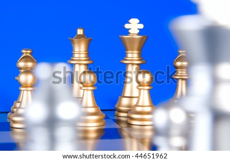 Chess combination from figures on a blue background