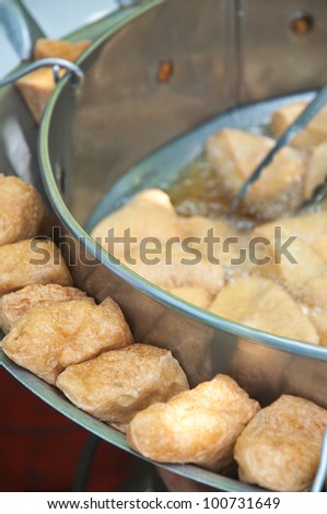 Fried  tofu with sauce is traditional chinese snacks.