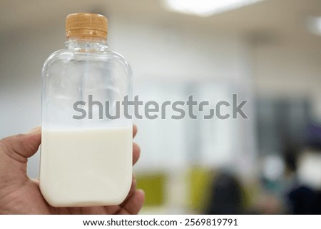 Similar – Image, Stock Photo Man taking milk box from the fridge