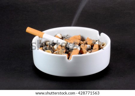 Similar – Image, Stock Photo Ashtray with cigarettes