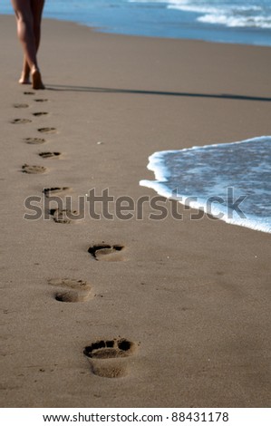 Human footprints on the sand