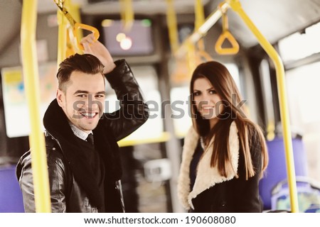 Portrait of affectionate couple in the city bus
