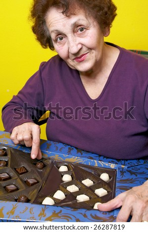Grandmother with big chocolate box