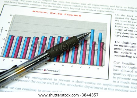 Close up of pen pointing to good results. Focus is on tip of pen. Document is fake, created by me.