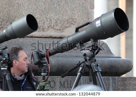 ROME, ITALY - MARCH 17: Photographers with long telephoto in St. Peter Square are waiting for the first Angelus prayer of Pope Francis I on March 17, 2013 in Vatican City, Rome, Italy